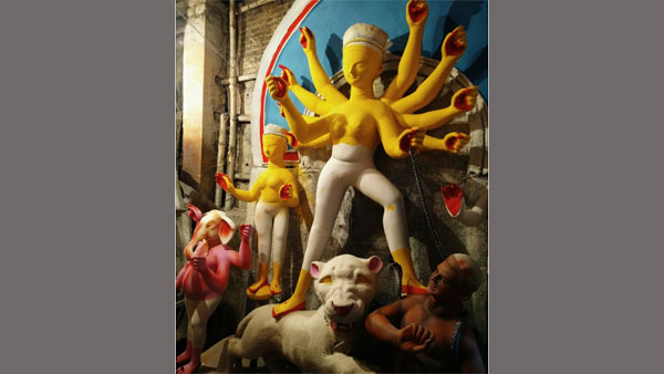 Durga idol during the drying process after applying chalk paint