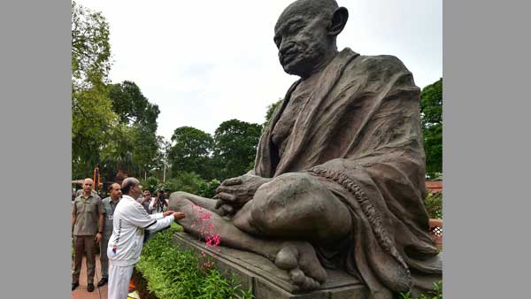LS Speaker Om Birla paying floral tributes to statue of Mahatma Gandhi