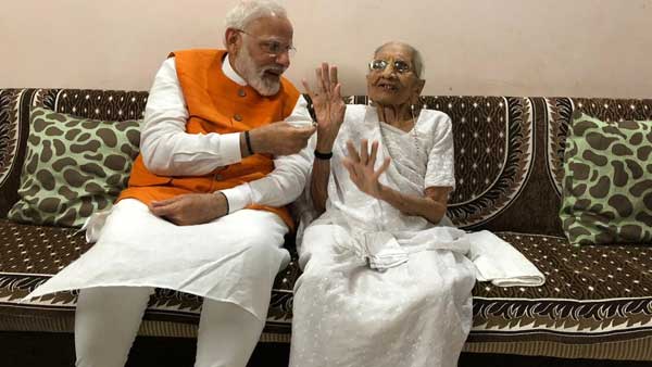 PM Modi interacting with his mother Heeraben Modi