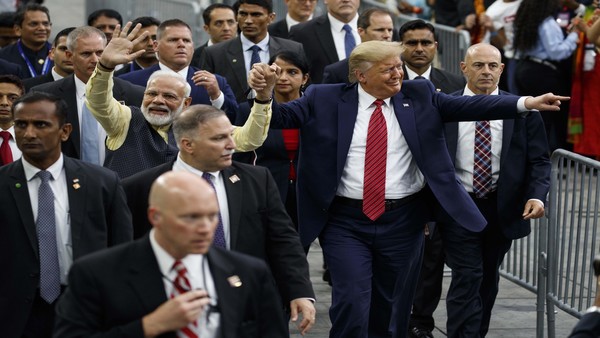 Both leaders take a joint lap greeting crowd Both leaders take a joint lap greeting crowd