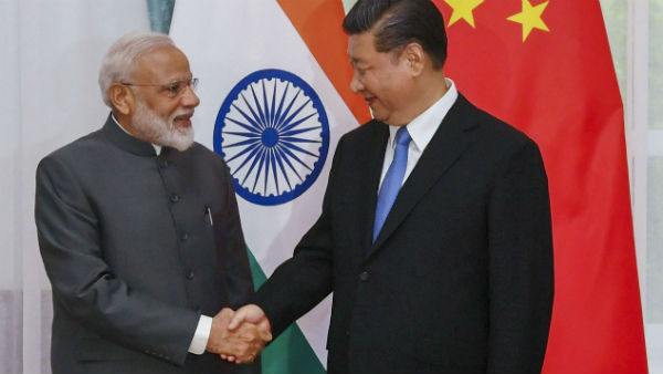 Narendra Modi and President Xi Jinping Narendra Modi and President Xi Jinping