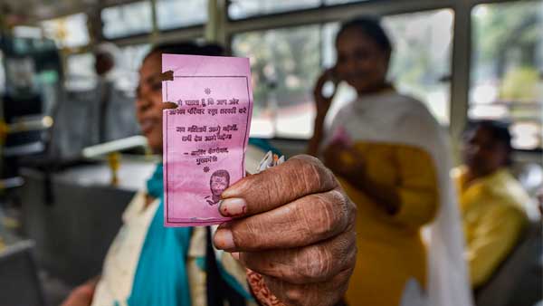 A woman shows the pink ticket during her ride on a DTC Bus in New Delhi A woman shows the pink ticket during her ride on a DTC Bus in New Delhi