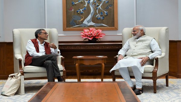 Abhijit Banerjee calls on Modi Abhijit Banerjee calls on Modi