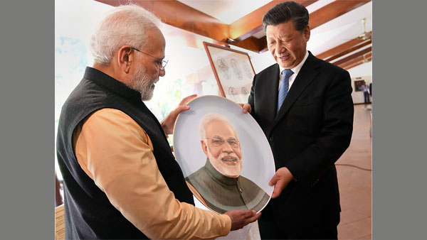PM Modi and Chinese President Xi Jinping exchange gifts