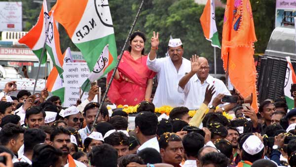Nationalist Congress Party (NCP) President Sharad Pawar waves at his supporters Nationalist Congress Party (NCP) President Sharad Pawar waves at his supporters