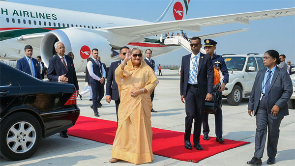 Sheikh Hasina waves upon her arrival at the airport Sheikh Hasina waves upon her arrival at the airport