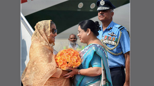 Sheikh Hasina is greeted by the dignitaries Sheikh Hasina is greeted by the dignitaries