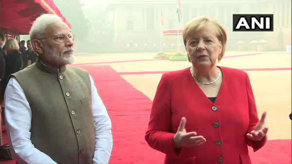 Angela Merkel to remain seated during National Anthems Angela Merkel to remain seated during National Anthems