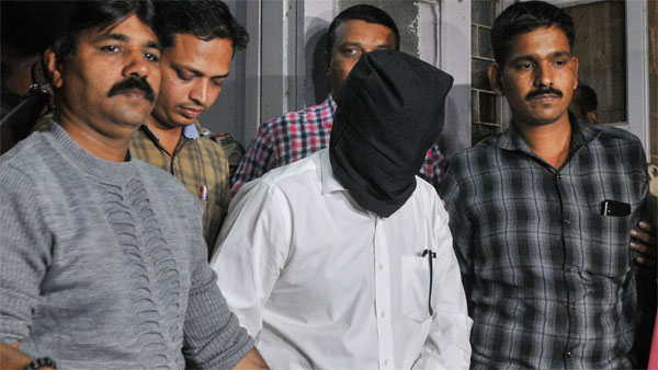 Neeraj Kumar Desai (face covered) Neeraj Kumar Desai (face covered)