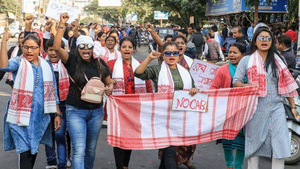 Gamosa with slogans like No CAB becomes signs of pride for Assam protest Gamosa with slogans like No CAB becomes signs of pride for Assam protest