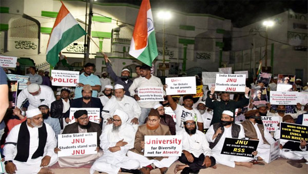 Members of Indian Youth Congress (IYC) takes out torchlight procession