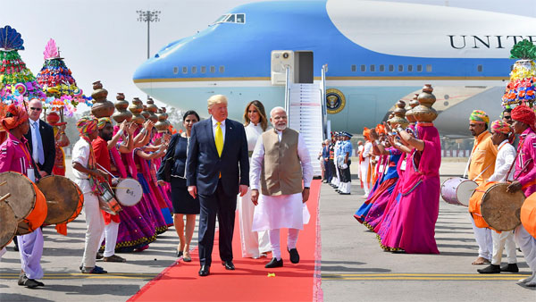 Folk artists perform as Prime Minister Narendra Modi welcomes US President Donald Trump and First Lady Melania Trump on their arrival at the Sardar Vallabhbhai Patel International Airport in Ahmedabad Folk artists perform as Prime Minister Narendra Modi welcomes US President Donald Trump and First Lady Melania Trump on their arrival at the Sardar Vallabhbhai Patel International Airport in Ahmedabad