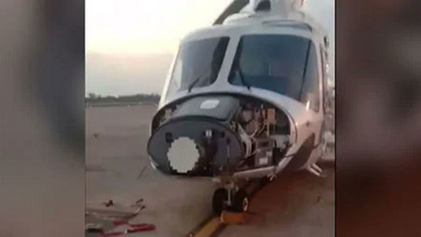 Man sits in front of SpiceJet flight which was about to take off; damages chopper Man sits in front of SpiceJet flight which was about to take off; damages chopper