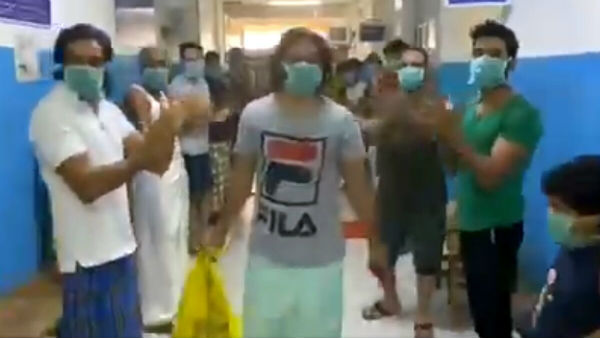 Viral video shows coronavirus survivor in Kerala cheered by Kasargod hospital staff Viral video shows coronavirus survivor in Kerala cheered by Kasargod hospital staff