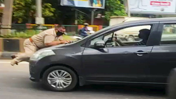 Punjab: Cop dragged on car bonnet in Jalandhar Punjab: Cop dragged on car bonnet in Jalandhar