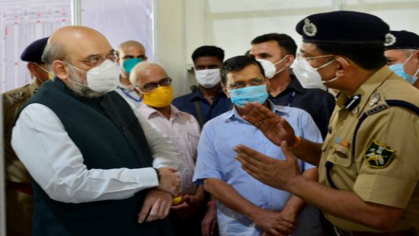 Amit Shah, Arvind Kejriwal visit 10,000-bed Covid care facility in Delhi. Image credit: PTI Amit Shah, Arvind Kejriwal visit 10,000-bed Covid care facility in Delhi. Image credit: PTI
