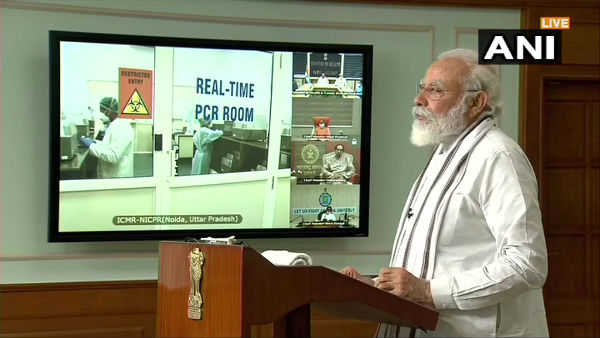 PM Modi launches 3 high throughput coronavirus testing facilities PM Modi launches 3 high throughput coronavirus testing facilities
