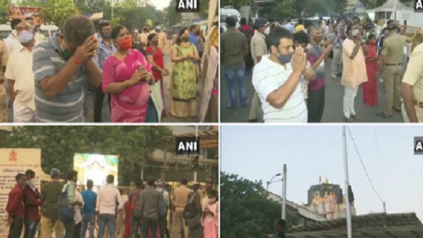 Angarki Sankashti Chaturthi 2021: Devotees bow their heads in prayer outside Siddhivinayak Temple Angarki Sankashti Chaturthi 2021: Devotees bow their heads in prayer outside Siddhivinayak Temple