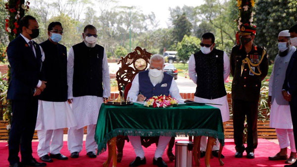 PM Modi arrives in Dhaka, plants sapling at National Martyrs Memorial PM Modi arrives in Dhaka, plants sapling at National Martyrs Memorial