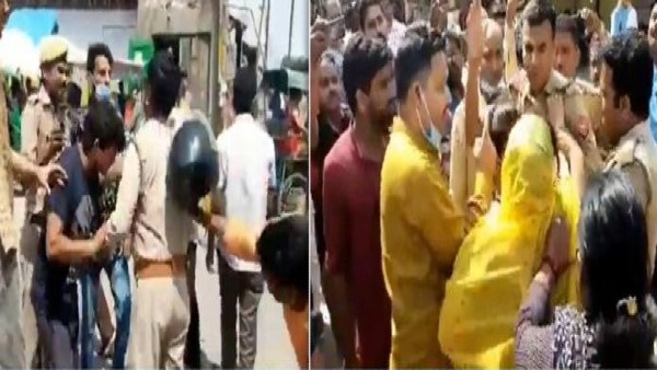 BJP, RSS workers enter into scuffle with police in Mathura, video of cop being thraashed goes viral BJP, RSS workers enter into scuffle with police in Mathura, video of cop being thraashed goes viral