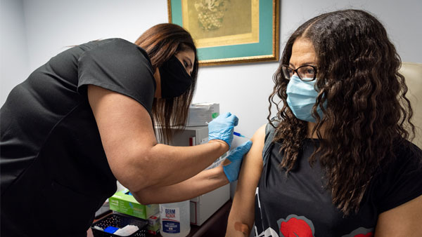 UK expands COVID-19 vaccination drive to cover all over aged 21 and 22 UK expands COVID-19 vaccination drive to cover all over aged 21 and 22