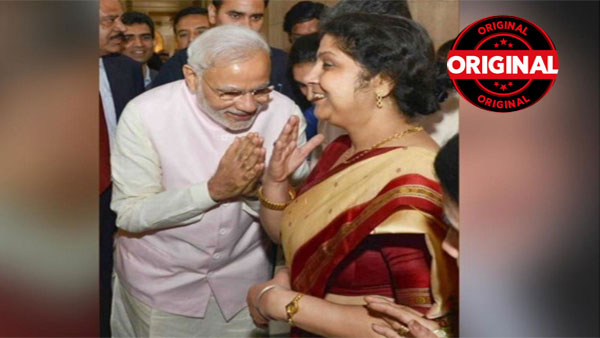 Former Prasar Bharti CEO shares morphed image of PM Modi bowing before Nita Ambani Former Prasar Bharti CEO shares morphed image of PM Modi bowing before Nita Ambani