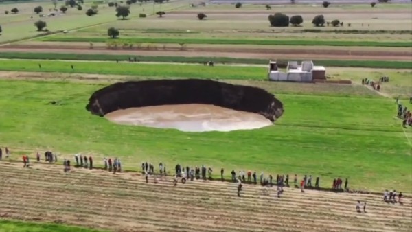 Sinkhole at Mexico farm swallows more land, traps 2 dogs Sinkhole at Mexico farm swallows more land, traps 2 dogs