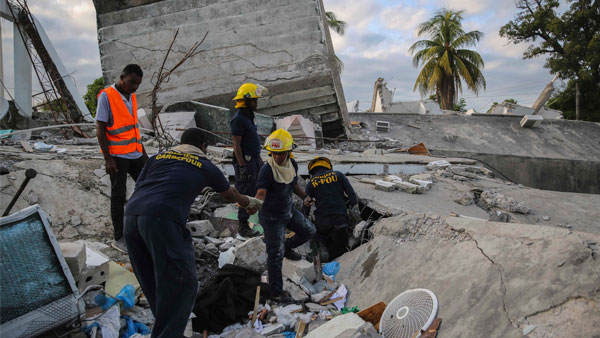 Haiti earthquake: Death toll soars to 1,297; US sends search teams Haiti earthquake: Death toll soars to 1,297; US sends search teams