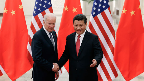 Chinese President Xi Jinping, right, shakes hands with then U.S. President Joe Biden Chinese President Xi Jinping, right, shakes hands with then U.S. President Joe Biden