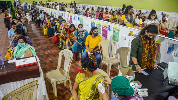Seventy per cent of Indias adult population administered first dose COVID-19 vaccine Seventy per cent of Indias adult population administered first dose COVID-19 vaccine