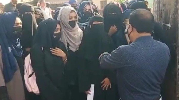Hijab row: Karnataka bans clothes that disturb harmony, public order in education institution Hijab row: Karnataka bans clothes that disturb harmony, public order in education institution