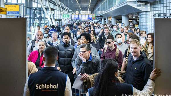 Amsterdam airport asks airlines cut flights amid crowd chaos Amsterdam airport asks airlines cut flights amid crowd chaos