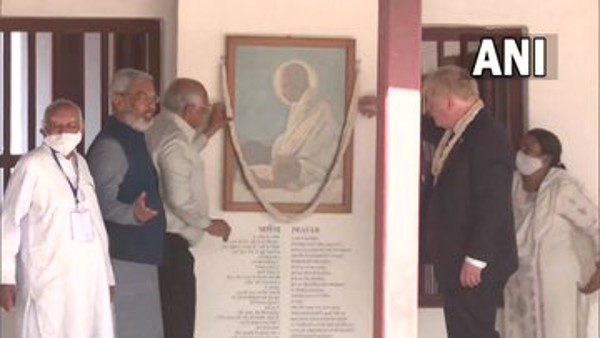 UK PM Boris Johnson pens message in Sabarmati Ashrams visitors book UK PM Boris Johnson pens message in Sabarmati Ashrams visitors book