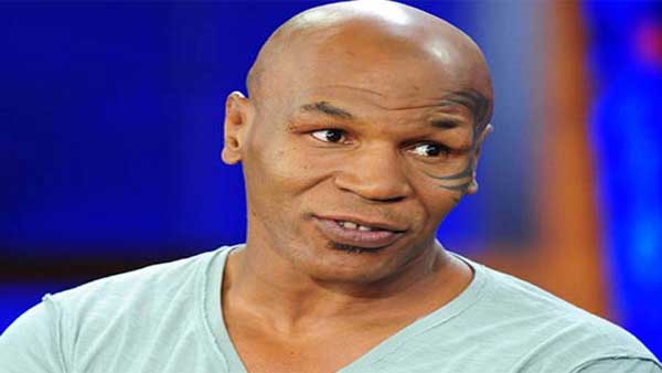 Viral video: World famous boxer Mike Tyson assaults an airline passenger Viral video: World famous boxer Mike Tyson assaults an airline passenger