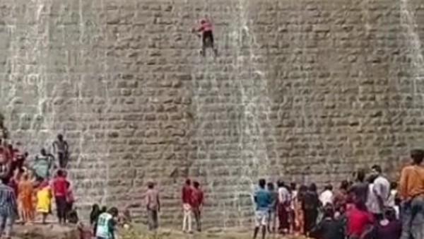 Watch: Daredevil stunt goes wrong, Man falls 30-feet while trying to climb Srinivasa Sagara dam wall Watch: Daredevil stunt goes wrong, Man falls 30-feet while trying to climb Srinivasa Sagara dam wall