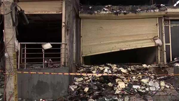 Delhi Mundka fire: Distraught relatives of victims look for loved ones at hospital Delhi Mundka fire: Distraught relatives of victims look for loved ones at hospital