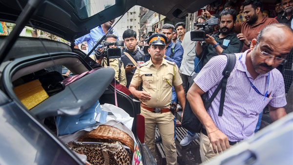 Gangster Dawood Ibrahims associate Salim Fruit being detianed by the National Investigation Agency (NIA) after conducting a raid, in Mumbai Gangster Dawood Ibrahims associate Salim Fruit being detianed by the National Investigation Agency (NIA) after conducting a raid, in Mumbai