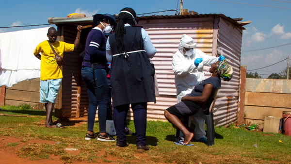 Health workers collects sample for coronavirus testing Health workers collects sample for coronavirus testing