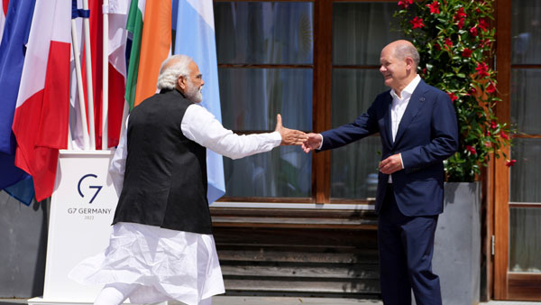 German Chancellor Olaf Scholz, right, greets Indias Prime Minister Narendra Modi during the official welcome ceremony of G7 leaders and Outreach guests at Castle Elmau in Kruen, near Garmisch-Partenkirchen, Germany German Chancellor Olaf Scholz, right, greets Indias Prime Minister Narendra Modi during the official welcome ceremony of G7 leaders and Outreach guests at Castle Elmau in Kruen, near Garmisch-Partenkirchen, Germany