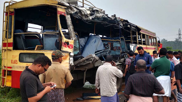 Locals at the site of the accident after a collision between a private tourist bus and a Kerala State Road Transport Corporation (KSRTC) bus on Wednesday night, at Vadakkenchery in Palakkad district Locals at the site of the accident after a collision between a private tourist bus and a Kerala State Road Transport Corporation (KSRTC) bus on Wednesday night, at Vadakkenchery in Palakkad district