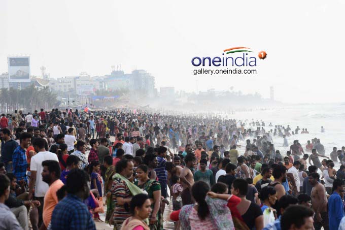 Devotees Takes Holy Dip At Vizag Beach Devotees Takes Holy Dip At Vizag Beach