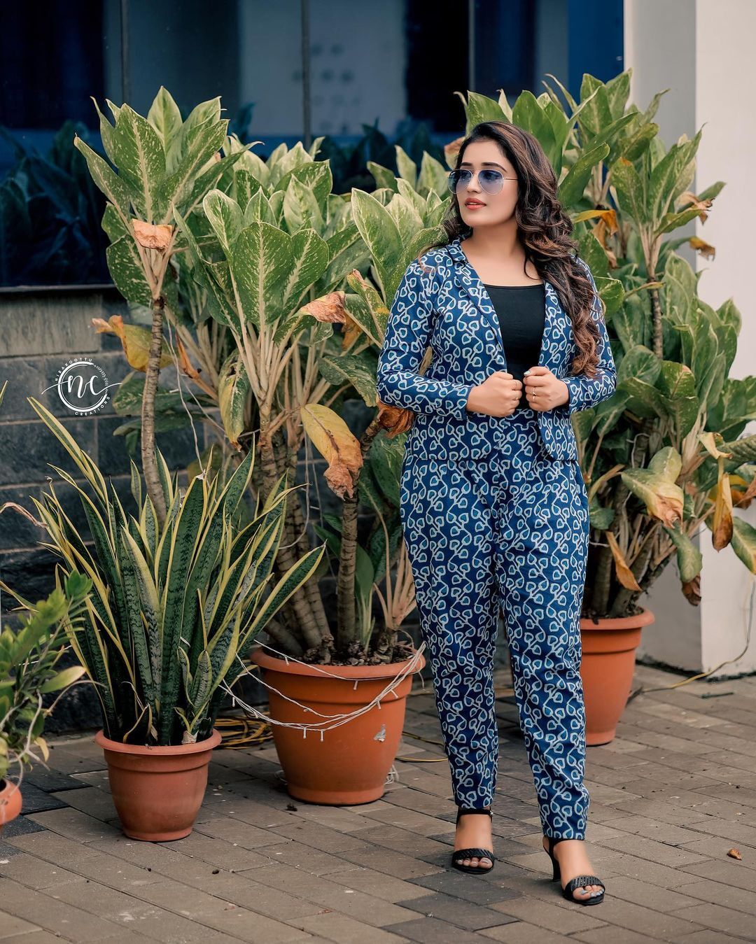 television-actress-anumol-rs-new-bold-and-stylish-photoshoot-with-blue